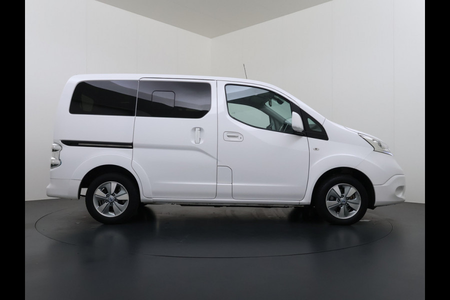 Nissan e-NV200 Evalia 7-Persoons SOH 93% 40kWh Camera Navi Stoel+Stuurverwarming Cruise Control Ecc Connect Edition Schuifdeuren Privacy Glas Lmv Regen+Lichtsensor Isofix Keyless 1e Eigenaar Origineel Nederlandse Bus