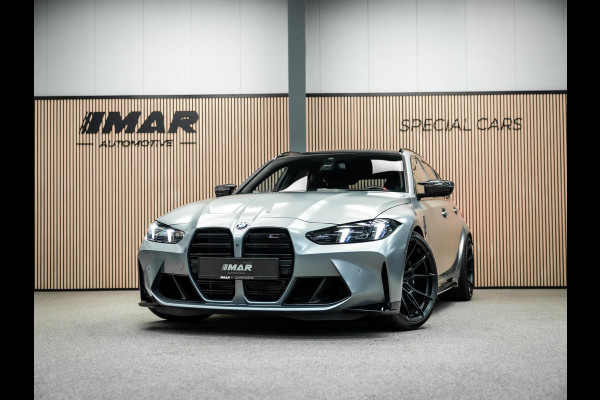 BMW 3 Serie Touring M3 xDrive Competition | Frozen Pure Grey II | WheelForce Velgen | Head-Up Display | Harman Kardon |
