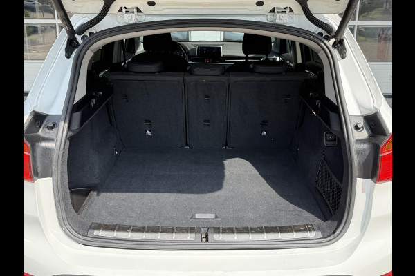BMW X1 xDrive20i High Executive | SPORTLINE | MEMORY STOELEN | SPORTSTOELEN | TREKHAAK | STOELVERWARMING | HEAD UP | 18 INCH |