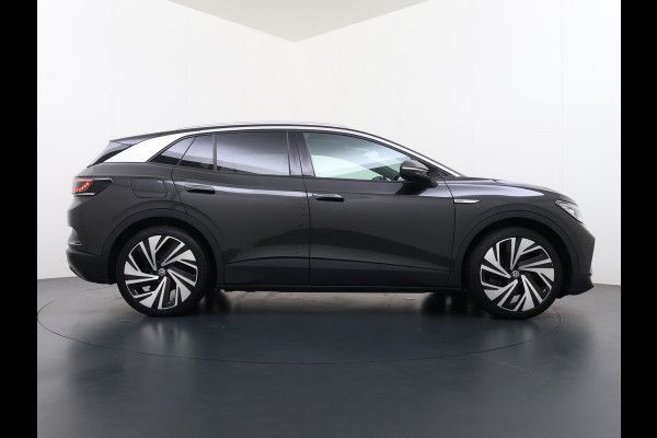 Volkswagen ID.4 Max 82kWh SOH 93% Warmtepomp Panoramdak Ergo Active+Memory Head-Up Display 360°Camera Stoel+Stuurverwarming Navi Ecc Pdc Apple Carplay/Android Auto Lmv 21" Keyless advanced display Matrix led Dodehoek detector Dealeronderhouden 1e Eigenaar Origineel Nederlandse Auto