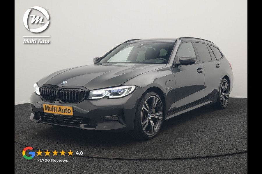 BMW 3 Serie Touring 330e Sportline PHEV 293pk Dealer O.H. | Dravitgrau | Trekhaak Af Fabriek | Adaptive Cruise | Laser LED | Head Up | Adaptief Onderstel | Camera | Sportstoelen Verwarmd | Sfeerverlichting | Keyless | Blis | Apple Carplay | 19"L.M | Plug In Hybrid |