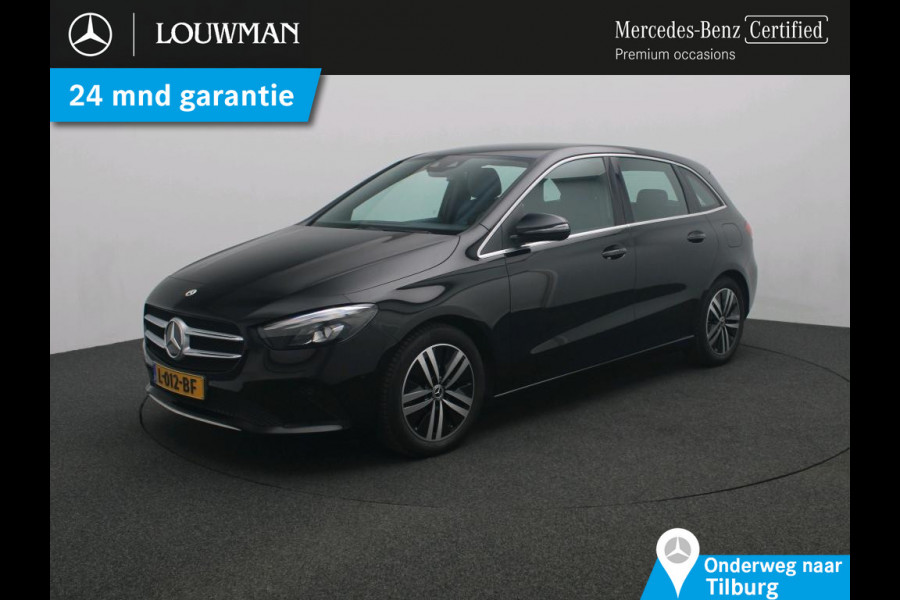 Mercedes-Benz B-Klasse 180 Business Solution Luxury Trekhaak | Parkeerpakket met achteruitrijcamera | Ledkoplampen | Sfeerverlichting | Stoelverwarming. Inclusief 24 maanden MB Certified garantie voor Europa.