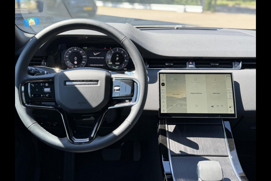 Land Rover Range Rover Evoque 2024 Model 1.5 P300e AWD R-Dynamic S VAN: 51.900,- VOOR: 49.877,- UW WKVOORDEEL €2.023,-:   NEW MODEL / FACELIFT PHEV 309 PK | UNIEK 8.000 KM | FABRIEKSGARANTIE t/m 26-02-2029 / 150.000 KM | DEALER ONDERHOUDEN | ADD. CRUISE | PANO DAK | ELEKTRISCHE STOEL MET GEHEUGEN | ELEKTRISCHE KOFFERBAK | CAMERA | RIJKLAAR PRIJS