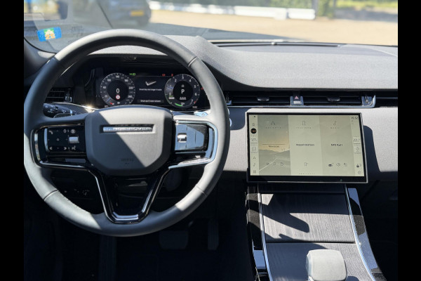 Land Rover Range Rover Evoque 2024 Model 1.5 P300e AWD R-Dynamic S VAN: 51.900,- VOOR: 49.877,- UW WKVOORDEEL €2.023,-:   NEW MODEL / FACELIFT PHEV 309 PK | UNIEK 8.000 KM | FABRIEKSGARANTIE t/m 26-02-2029 / 150.000 KM | DEALER ONDERHOUDEN | ADD. CRUISE | PANO DAK | ELEKTRISCHE STOEL MET GEHEUGEN | ELEKTRISCHE KOFFERBAK | CAMERA | RIJKLAAR PRIJS