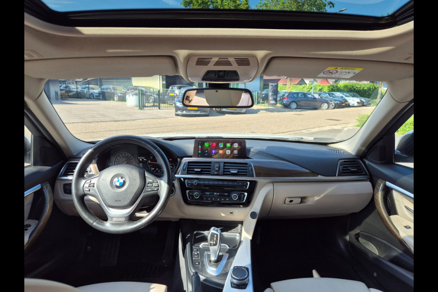 BMW 3-serie 320i Luxury Edition Individual Schuifdak Apple CarPlay Virtual dash Camera LED NAP 2e eigenaar 320i Luxury Edition