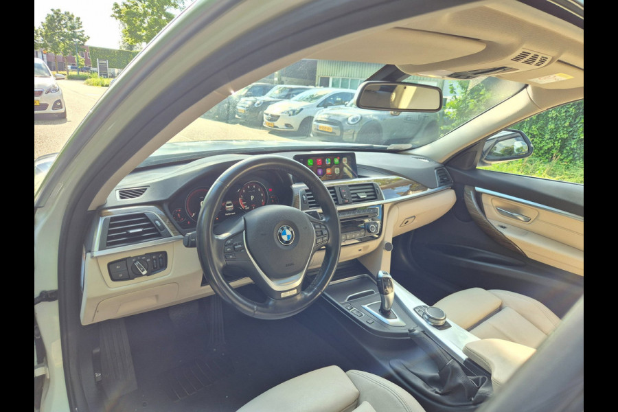 BMW 3-serie 320i Luxury Edition Individual Schuifdak Apple CarPlay Virtual dash Camera LED NAP 2e eigenaar 320i Luxury Edition