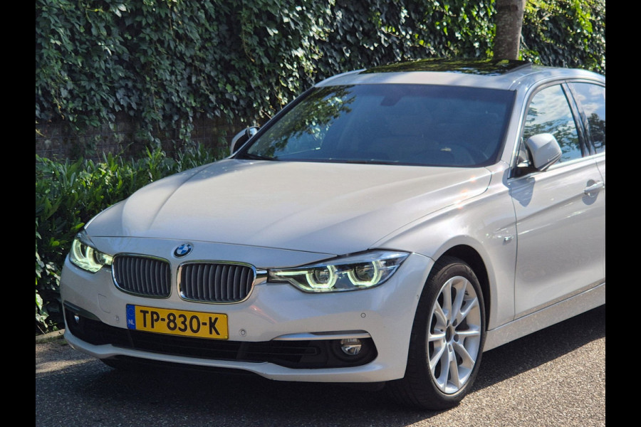 BMW 3-serie 320i Luxury Edition Individual Schuifdak Apple CarPlay Virtual dash Camera LED NAP 2e eigenaar 320i Luxury Edition