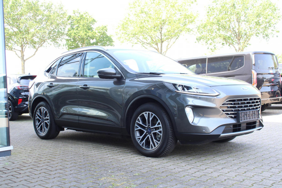 Ford Kuga 2.5 PHEV Titanium X | Wegklapbare trekhaak | Winter Pack | Adaptive cruise control | Dodehoeksesoren | Half leder | Bang&Olufsen