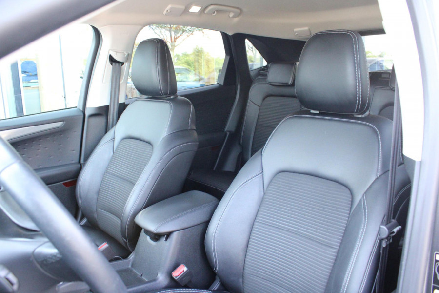 Ford Kuga 2.5 PHEV Titanium X | Wegklapbare trekhaak | Winter Pack | Adaptive cruise control | Dodehoeksesoren | Half leder | Bang&Olufsen