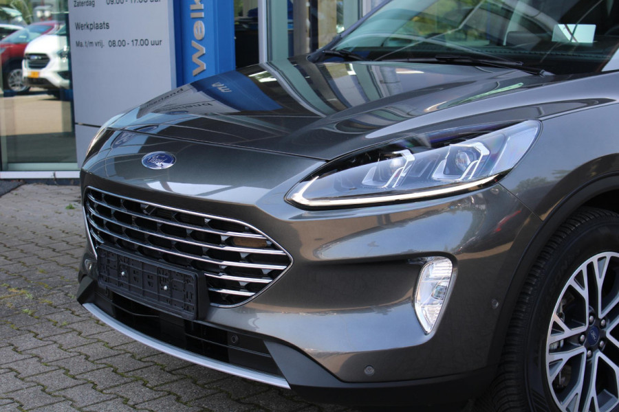 Ford Kuga 2.5 PHEV Titanium X | Wegklapbare trekhaak | Winter Pack | Adaptive cruise control | Dodehoeksesoren | Half leder | Bang&Olufsen