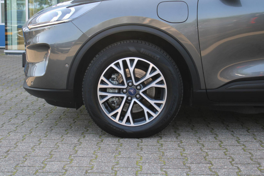 Ford Kuga 2.5 PHEV Titanium X | Wegklapbare trekhaak | Winter Pack | Adaptive cruise control | Dodehoeksesoren | Half leder | Bang&Olufsen