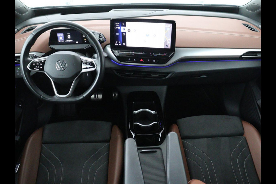 Volkswagen ID.4 Tech 77 kWh | SOH 92,2% | Panorama | 360 Camera | Head up | Virtual cockpit | Sfeerverlichting | Stoel/Stuurverwarming | Adaptive cruise | Carplay | Traffic assist | Climate control | Half leder/velours