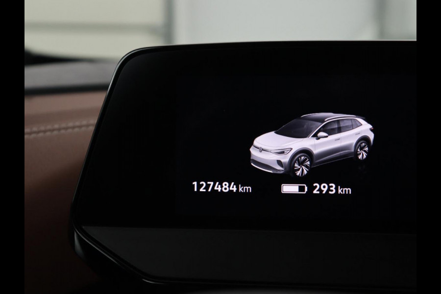 Volkswagen ID.4 Tech 77 kWh | SOH 92,2% | Panorama | 360 Camera | Head up | Virtual cockpit | Sfeerverlichting | Stoel/Stuurverwarming | Adaptive cruise | Carplay | Traffic assist | Climate control | Half leder/velours