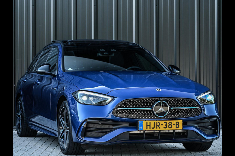 Mercedes-Benz C-Klasse Estate 300 e Business Solution AMG | NL-Auto | Panoramadak | 360 Camera | Burmester | Night-Pakket | Memory Seats | Head-Up | ACC | Ambiance Interieur | Stuurverwarming |