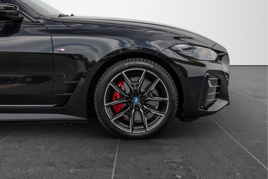 BMW i4 eDrive40 High Executive 84 kWh M-Pakket M-sportstoelen Schuif/kantel HuD