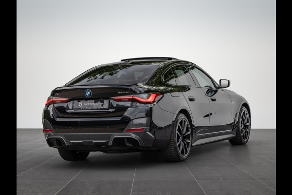 BMW i4 eDrive40 High Executive 84 kWh M-Pakket M-sportstoelen Schuif/kantel HuD