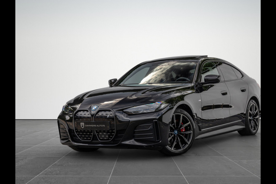 BMW i4 eDrive40 High Executive 84 kWh M-Pakket M-sportstoelen Schuif/kantel HuD