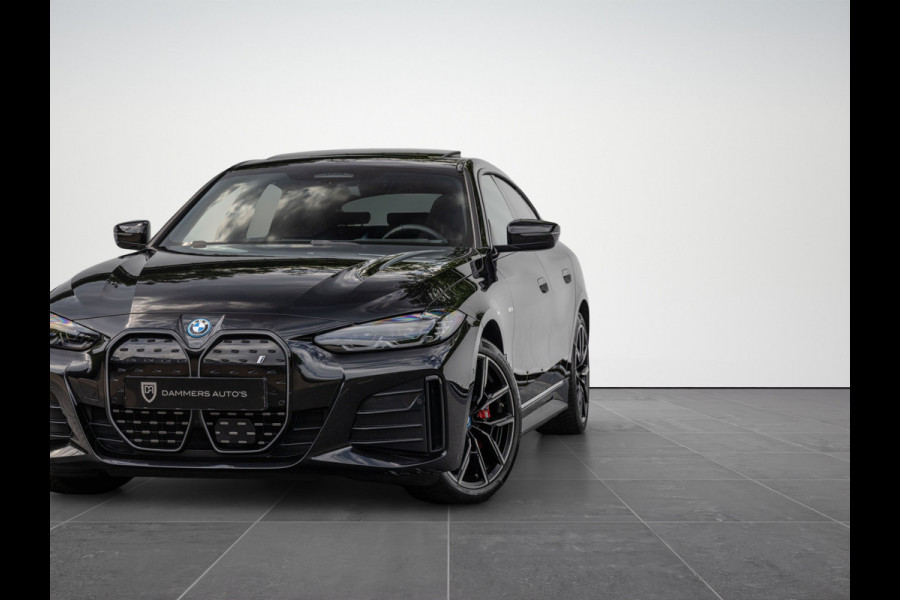 BMW i4 eDrive40 High Executive 84 kWh M-Pakket M-sportstoelen Schuif/kantel HuD