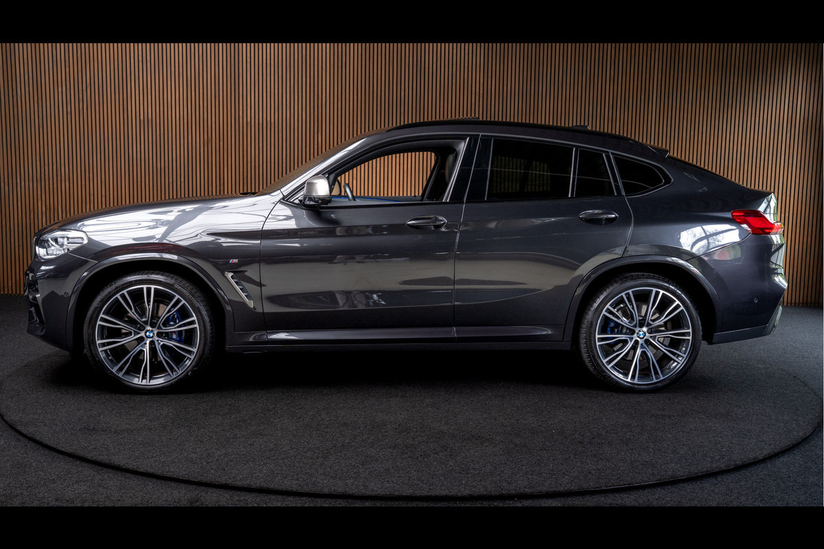 BMW X4 M40i HUD Panodak 360° Harman K Leer ACC Navi Keyless Entry & Go Elektr. uitklapbare trekhaak Elektr. bedienbare achterklep Memory seats Climate voor & achter PDC Zwarte hemelbekleding 21 inch LM v