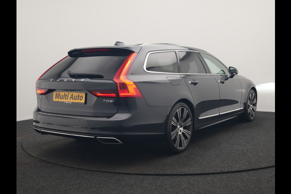 Volvo V90 T8 AWD Inscription PHEV 394pk Dealer O.H. | Trekhaak Af Fabriek | Panodak | Adaptive Cruise | Harman / Kardon | Head Up | Camera | Lederen Sportstoelen Massage & Ventilatie & Memory | Apple Carplay | Stuur Verwarmd | Blis | Plug In Hybrid |