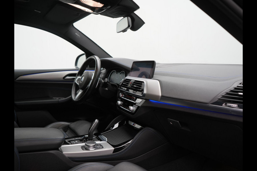 BMW X4 M40i M Sport 354pk | Trekhaak Af Fabriek | Panodak | Head Up | Adaptive Cruise | 360 Camera | Adaptief Onderstel | Lederen Sportstoelen Memory & Verwarmd | 21"L.M | Keyless | Blis | Sfeerverlichting | Apple Carplay |