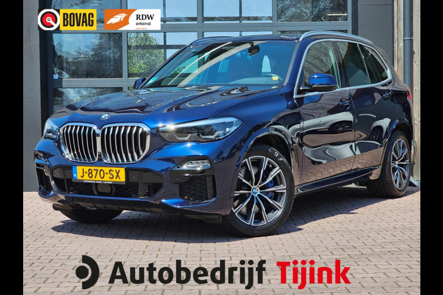 BMW X5 xDrive45e High Executive M-Sport | Luchtvering |  Elek. trekhaak | Safety pack | Achterasbesturing | HUD | M aerodynamica | Leder |