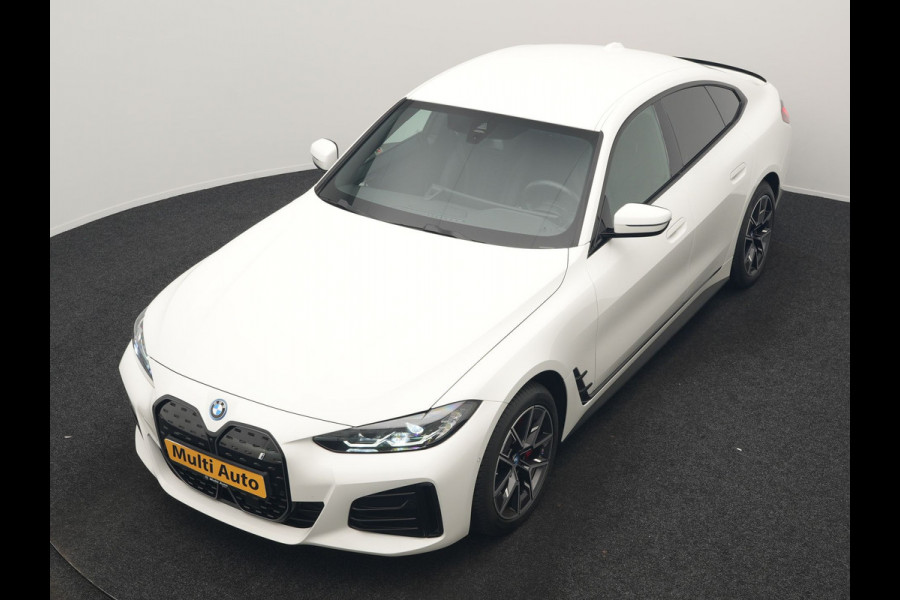 BMW i4 eDrive35 M Sport PRO 70 kWh 286pk Dealer O.H | Trekhaak Af Fabriek | Adaptive Cruise | 360 Camera | Adaptive Onderstel |  Alcantara Sportstoelen Verwarmd | Widescreen Navi | Apple Carplay | Virtual | DAB | 18" L.M |