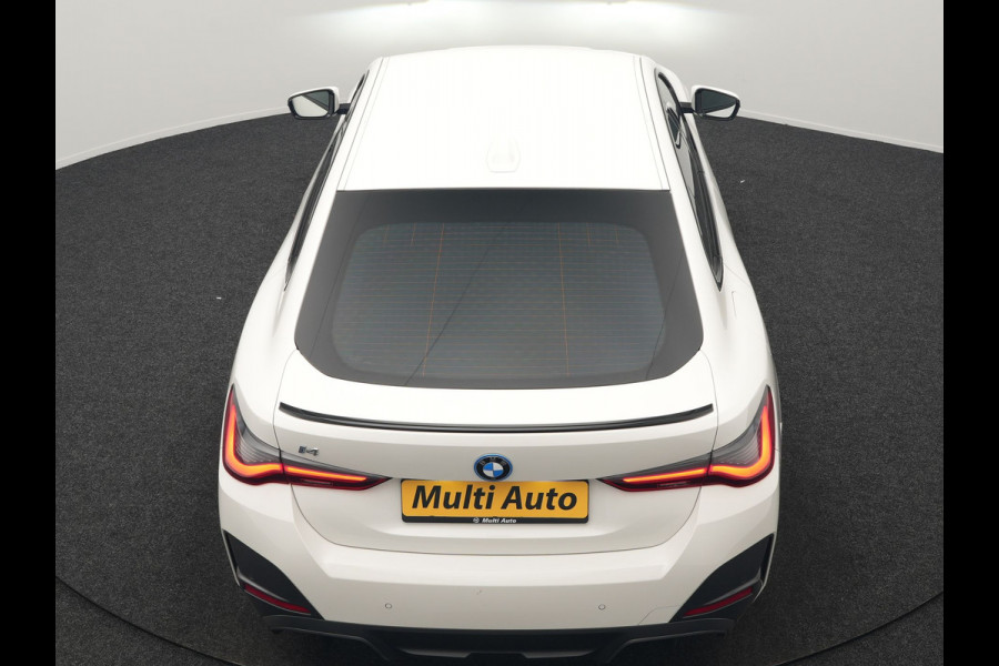 BMW i4 eDrive35 M Sport PRO 70 kWh 286pk Dealer O.H | Trekhaak Af Fabriek | Adaptive Cruise | 360 Camera | Adaptive Onderstel |  Alcantara Sportstoelen Verwarmd | Widescreen Navi | Apple Carplay | Virtual | DAB | 18" L.M |