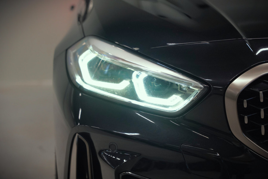 BMW 1-serie M135i xDrive High Executive Edition | M Performance | Stoelverwarming | Cruise Control | Adaptive LED | Ambiance Verlichting | HIFI | Grootlichtassistent | M Sport Remmen