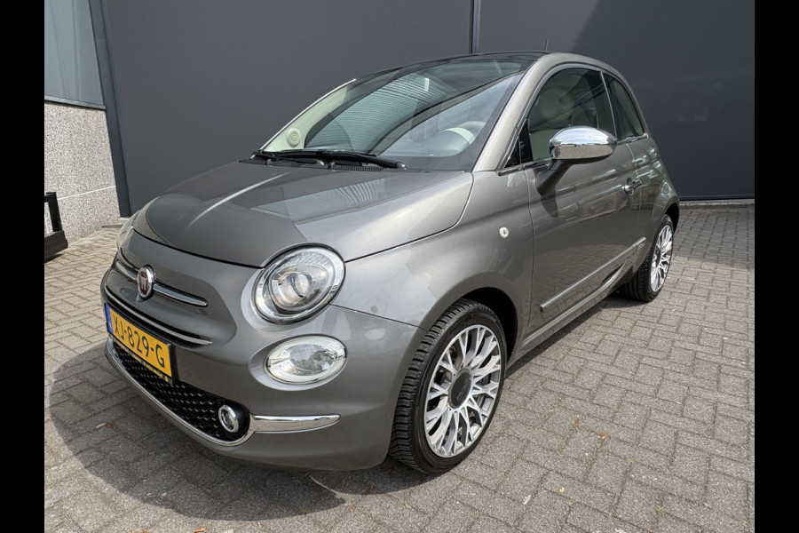 Fiat 500C 0.9 TwinAir Turbo Lounge Automaat Glazen panoramadak - Airco - Navigatie - Parkeersensor achter - Licht metalen velgen 15 inch - Cruise control - Mistlampen - Elektrische ramen - Stuur multifunctioneel - Bluetooth - Centrale vergrendeling met afstandsbediening - Start/stop systeem