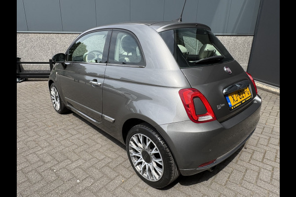 Fiat 500C 0.9 TwinAir Turbo Lounge Automaat Glazen panoramadak - Airco - Navigatie - Parkeersensor achter - Licht metalen velgen 15 inch - Cruise control - Mistlampen - Elektrische ramen - Stuur multifunctioneel - Bluetooth - Centrale vergrendeling met afstandsbediening - Start/stop systeem