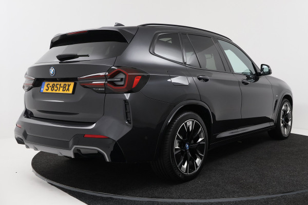BMW iX3 High Executive 80 kWh (SOH 98,1%, PANO, TREKHAAK WEGKLAPBAAR, STOEL/STUUR VERWARMING, ELEKTR STOELEN, CRUISE ADAPTIEF)