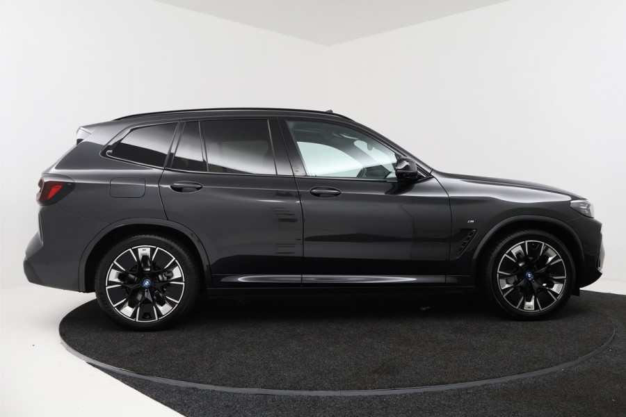 BMW iX3 High Executive 80 kWh (SOH 98,1%, PANO, TREKHAAK WEGKLAPBAAR, STOEL/STUUR VERWARMING, ELEKTR STOELEN, CRUISE ADAPTIEF)