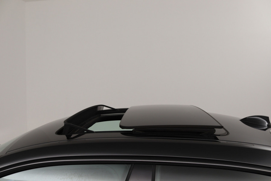 BMW 2 Serie Gran Coupé 218i Business Edition Plus (PANORAMADAK, CAMERA, SFEERVERLICHTING, STOELVERWARMING, PARKEERSENSOREN)