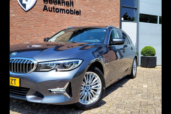 BMW 3 Serie Touring 320e Luxury - Pano, Trekhaak, Laser (NL NAP BTW)