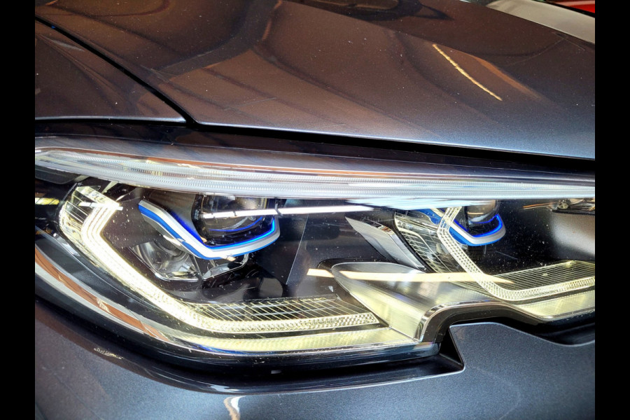 BMW 3 Serie Touring 320e Luxury - Pano, Trekhaak, Laser (NL NAP BTW)