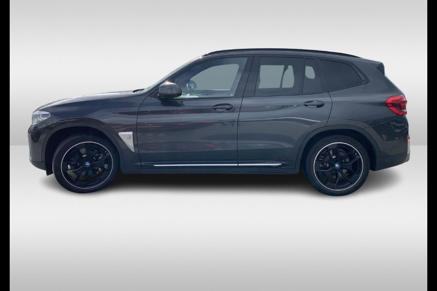BMW iX3 High Executive 80 kWh / Panoramadak / Camera / Head-up / 20'' / Leder / Harman Kardon / Navigatie / Memory seats / Dodehoek / DAB / Stoelverwarming / Cruise Control Adaptief