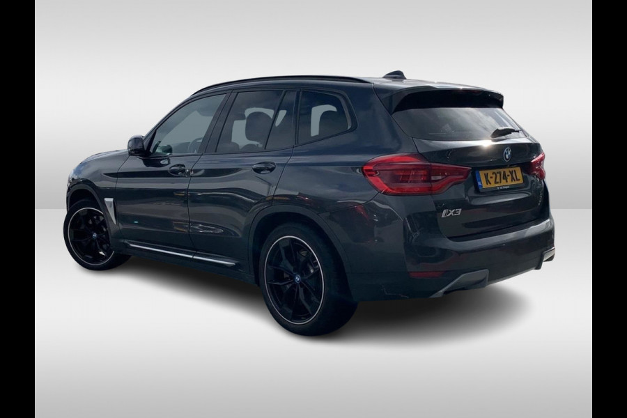 BMW iX3 High Executive 80 kWh / Panoramadak / Camera / Head-up / 20'' / Leder / Harman Kardon / Navigatie / Memory seats / Dodehoek / DAB / Stoelverwarming / Cruise Control Adaptief