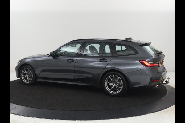 BMW 3-serie 320i Executive Edition | Sport Line | Trekhaak | Harman/Kardon | Sfeerverlichting | Carplay | Half leder | Live Cockpit | Parkeerhulp | Navigatie | Climate control | Full LED | Bluetooth | Cruise control