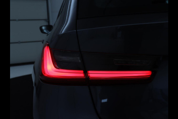 BMW 3-serie 320i Executive Edition | Sport Line | Trekhaak | Harman/Kardon | Sfeerverlichting | Carplay | Half leder | Live Cockpit | Parkeerhulp | Navigatie | Climate control | Full LED | Bluetooth | Cruise control