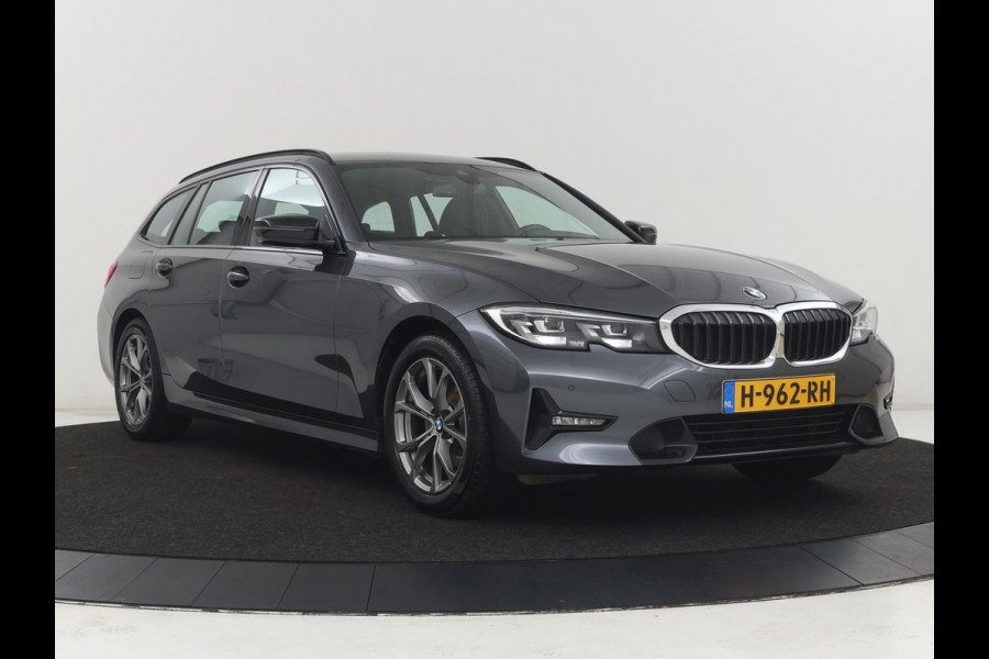 BMW 3-serie 320i Executive Edition | Sport Line | Trekhaak | Harman/Kardon | Sfeerverlichting | Carplay | Half leder | Live Cockpit | Parkeerhulp | Navigatie | Climate control | Full LED | Bluetooth | Cruise control