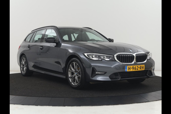 BMW 3-serie 320i Executive Edition | Sport Line | Trekhaak | Harman/Kardon | Sfeerverlichting | Carplay | Half leder | Live Cockpit | Parkeerhulp | Navigatie | Climate control | Full LED | Bluetooth | Cruise control