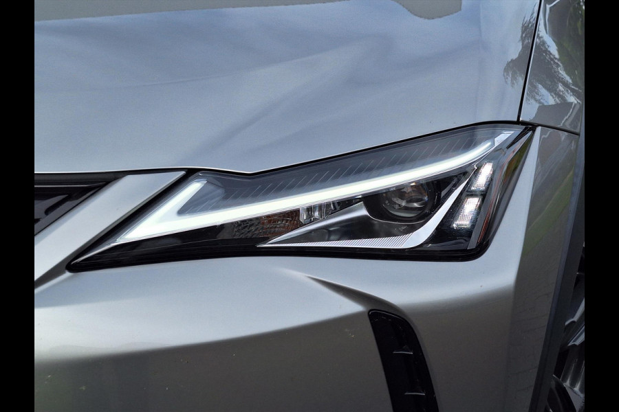 Lexus UX 250h AWD Luxury Line | 4X4, Leer, Stoelverwarming, Navigatie, Parkeersensoren, 18 inch, Privacy glass