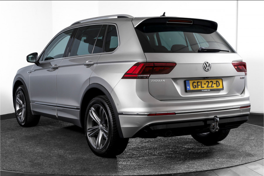 Volkswagen Tiguan 2.0 TSI 4Motion Highline Business R 180 PK | R-Line | Elek. Trekhaak | Adapt. Cruise | Stoel-+Bankverw. | PDC | Camera | NAV + App. Connect | ECC | Elek. Klep | LM 19" |