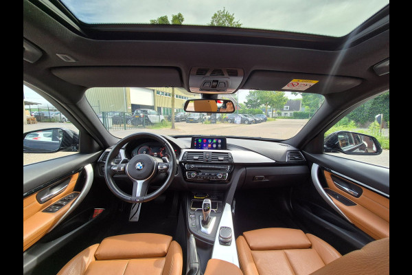 BMW 3 Serie Touring 320i M Sport Ed volle optielijst Trekhaak Pano CarPlay 19inch M Velgen Stuurverwarming NAP M Sport Edition