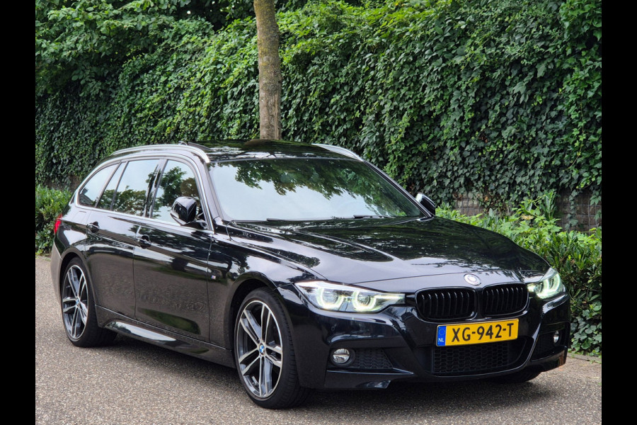 BMW 3 Serie Touring 320i M Sport Ed volle optielijst Trekhaak Pano CarPlay 19inch M Velgen Stuurverwarming NAP M Sport Edition