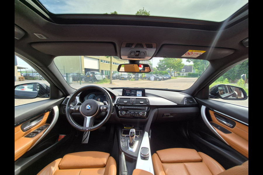 BMW 3 Serie Touring 320i M Sport Ed volle optielijst Trekhaak Pano CarPlay 19inch M Velgen Stuurverwarming NAP M Sport Edition
