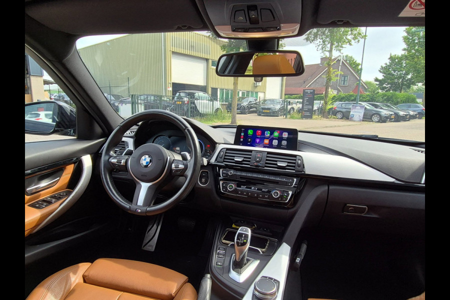 BMW 3 Serie Touring 320i M Sport Ed volle optielijst Trekhaak Pano CarPlay 19inch M Velgen Stuurverwarming NAP M Sport Edition