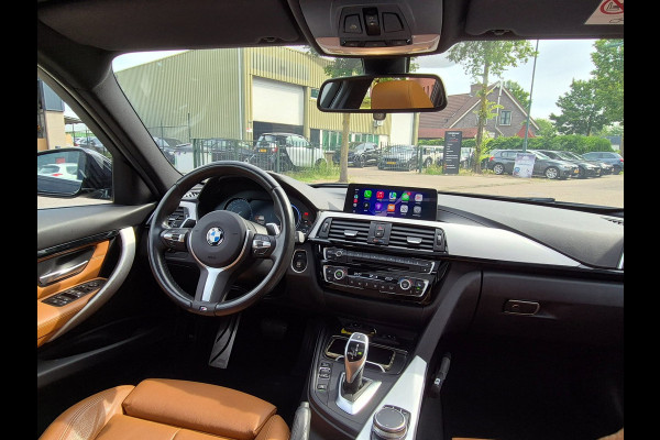 BMW 3 Serie Touring 320i M Sport Ed volle optielijst Trekhaak Pano CarPlay 19inch M Velgen Stuurverwarming NAP M Sport Edition