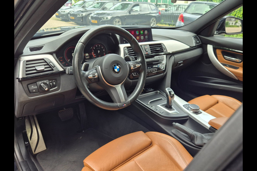 BMW 3 Serie Touring 320i M Sport Ed volle optielijst Trekhaak Pano CarPlay 19inch M Velgen Stuurverwarming NAP M Sport Edition